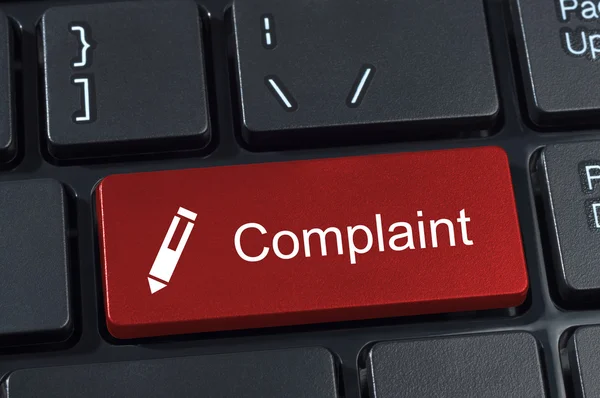 Complaint button keyboard with pen icon. — Stock Photo, Image