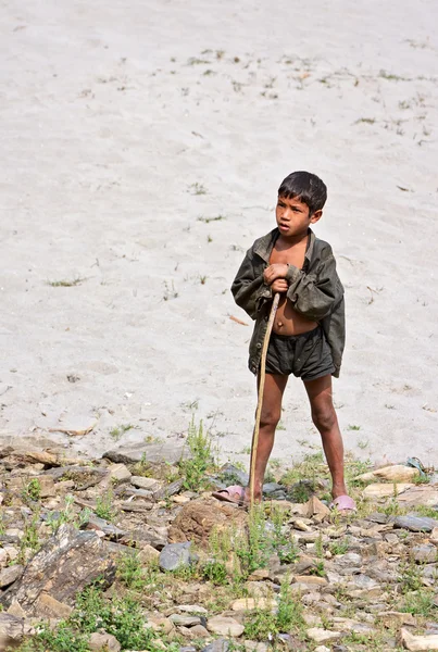 KALANKI - APRIL 2: Portrait of Nepalese herder boy with a rod — Stock Photo, Image