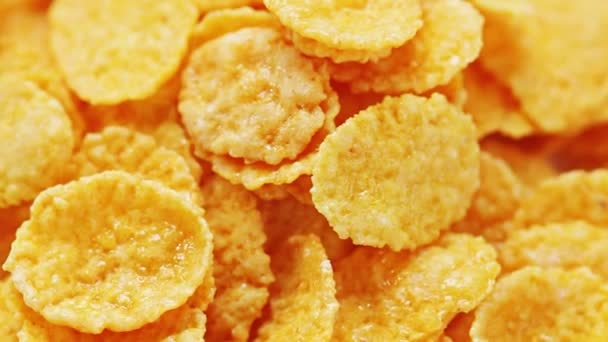 Roterende zoete cornflakes, macro de achtergrond van het voedsel van de weergave — Stockvideo
