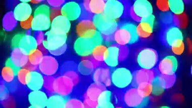 Aydınlatma çelenk yanıp sönen bokeh arka plan ile yakınlaştırma ve uzaklaştırma