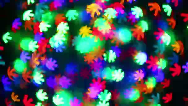 Illumination garland decoration blinking snowflake shaped bokeh background — Stock Video
