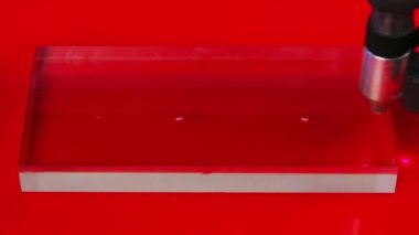 Laser cnc machine engraving design pattern on transparent acryl plate