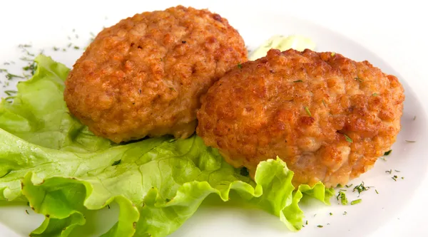 Cutlets and salad on a plate — Stock Photo, Image
