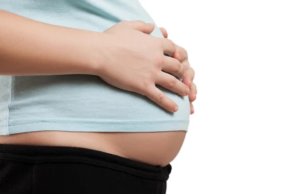 Těhotná žena tuhnutí břicha a dojemné — Stock fotografie