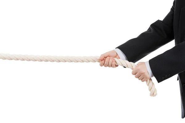 Ділова людина рука тримає або тягне мотузку — стокове фото