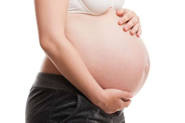 Zwangere vrouw aan te raken of haar buik bonding — Stockfoto