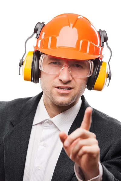 Businessman in safety hardhat helmet gesturing exclamation point — Stock Photo, Image