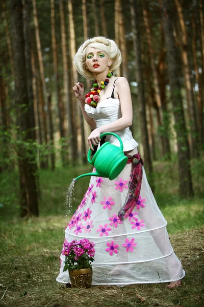 Watering flowers — Stock Photo, Image