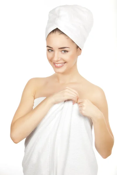 Beautiful brunette young woman in bath towels — Stock Photo, Image