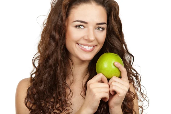 Beautiful brunette holding apple — Stock Photo, Image