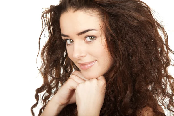 Beautiful curtly brunette young woman — Stock Photo, Image