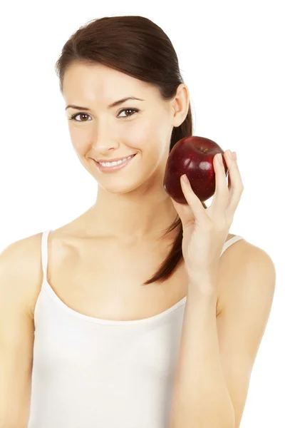 Güzel esmer holding elma — Stok fotoğraf