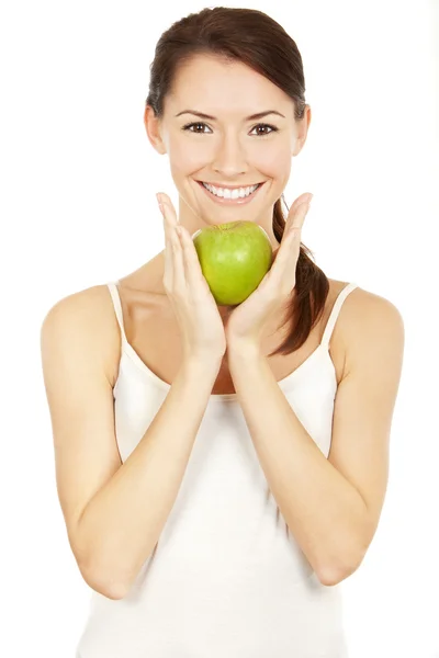 Beautiful brunette holding apple — Stock Photo, Image