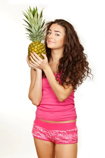 Bella bruna con ananas in mano — Foto Stock