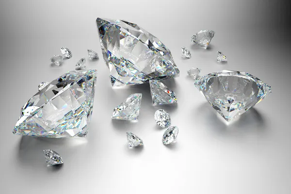 Group of diamonds on grey background — Stock Photo, Image