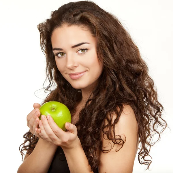 Linda morena segurando maçã — Fotografia de Stock