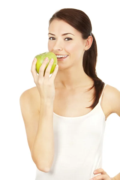 Beautiful brunette holding apple — Stock Photo, Image