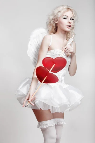 Young blond woman in angel costume — Stock Photo, Image