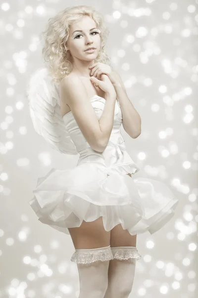 Young blond woman in angel costume — Stock Photo, Image