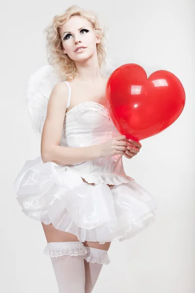 Young blond woman in angel costume — Stock Photo, Image