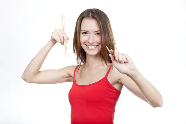 Beautiful brunette woman sushi chopsticks — Stock Photo, Image