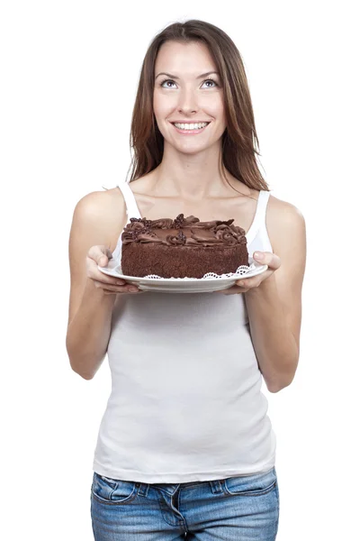 Beautiful brunette woman holding chocolate cake — Stock Photo, Image