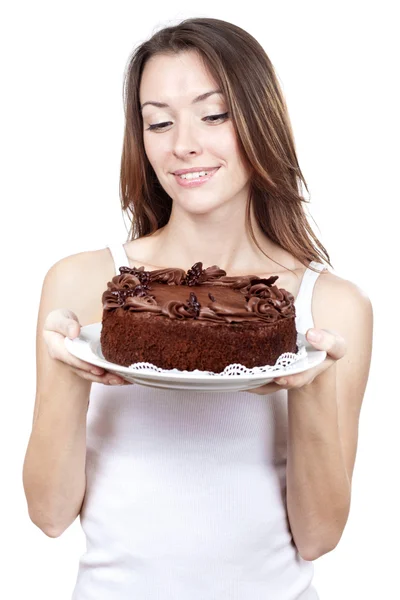 Beautiful brunette woman holding chocolate cake — Stock Photo, Image