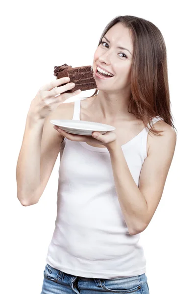 美丽的年轻女子吃巧克力蛋糕 — 图库照片