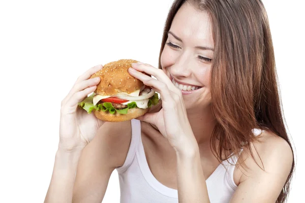 Bella giovane donna in possesso di hamburger — Foto Stock