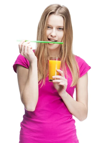 Young woman holding glass of orange juice — Stock Photo, Image