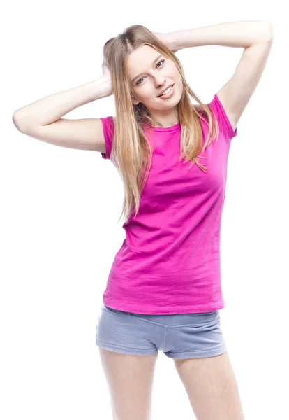 Mladá krásná žena nosí růžové tričko — Stock fotografie