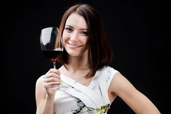 Mujer sosteniendo copa de vino — Foto de Stock