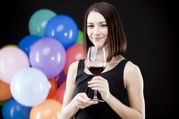 Woman holding wine glass — Stock Photo, Image