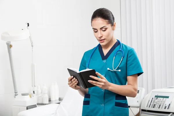 Beautiful brunette woman medical worker — Stock Photo, Image