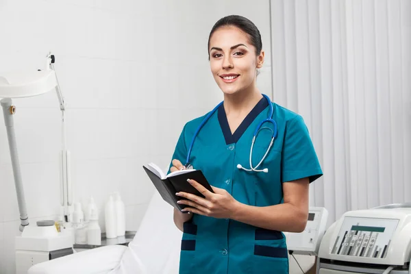 Beautiful brunette woman medical worker — Stock Photo, Image