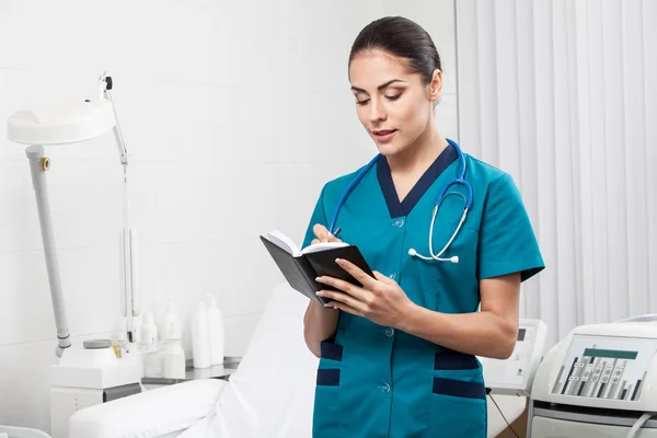 Beautiful brunette woman medical worker — Stock Photo, Image