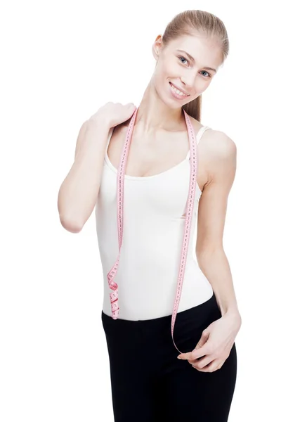 Young blond woman measuring waist — Stock Photo, Image