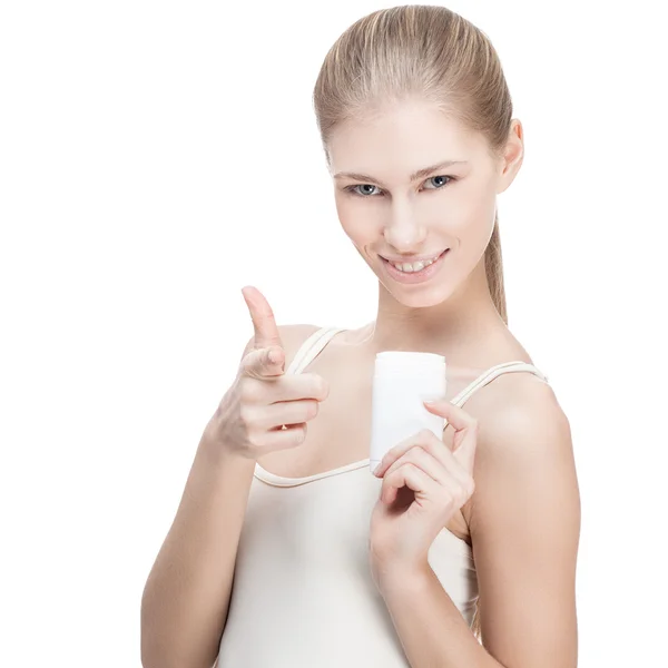 Ung blond kvinna anläggning antiperspirant — Stockfoto