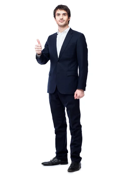 Улыбающийся бизнесмен с большим пальцем вверх — стоковое фото
