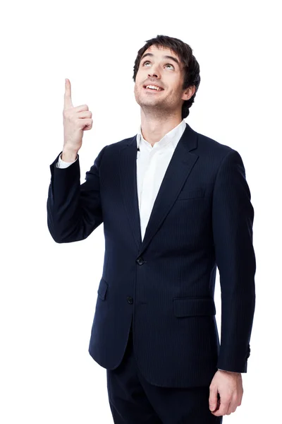 Businessman pointing at copy space — Stock Photo, Image