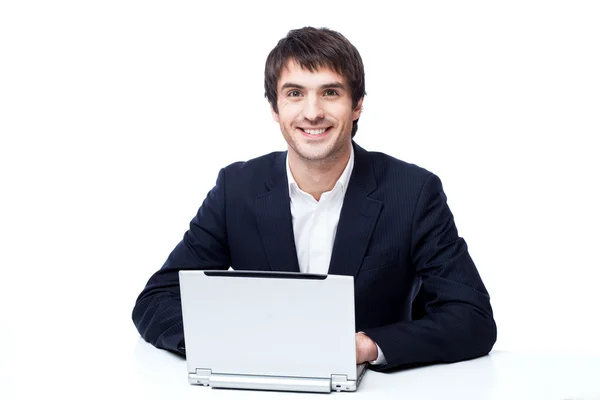 Homem de negócios com laptop isolado no branco — Fotografia de Stock
