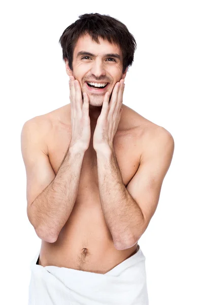 Happy young man with the towel around his waist — Stock Photo, Image