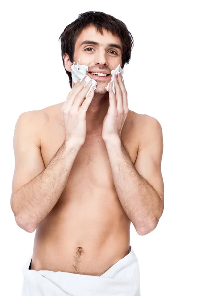 Счастливый молодой человек с полотенцем на поясе — стоковое фото