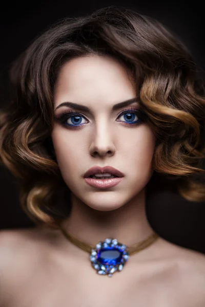 Beauty styled closeup portrait of a young woman — Stock Photo, Image