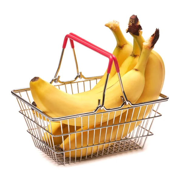 Estúdio tiro de bananas monte na cesta de compras isolado no fundo branco — Fotografia de Stock