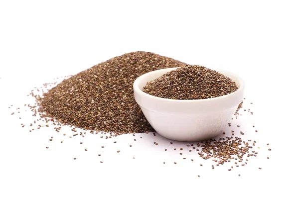 Ceramic bowl of organic natural chia seeds close-up isolated — 图库照片