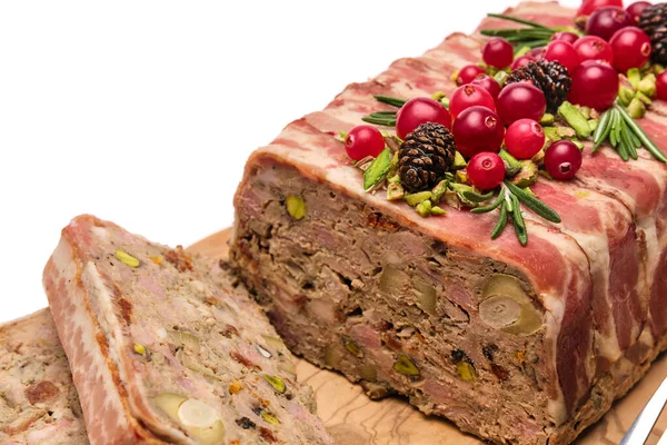 Traditional French terrine covered with bacon isolated on wooden cutting or serving board — Fotografie, imagine de stoc