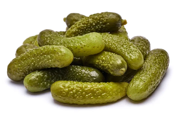 Pile of of Tasty canned Whole green cornichons isolated on a white background — Stock Photo, Image