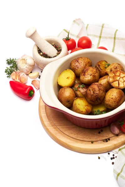 Baked potato in a clay pot isolated on white background — Stock Photo, Image