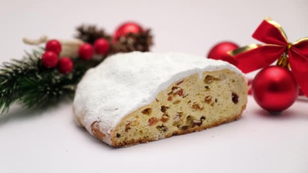 Sliced Traditional Christmas stollen cake with marzipan and dried fruit — Stock Video